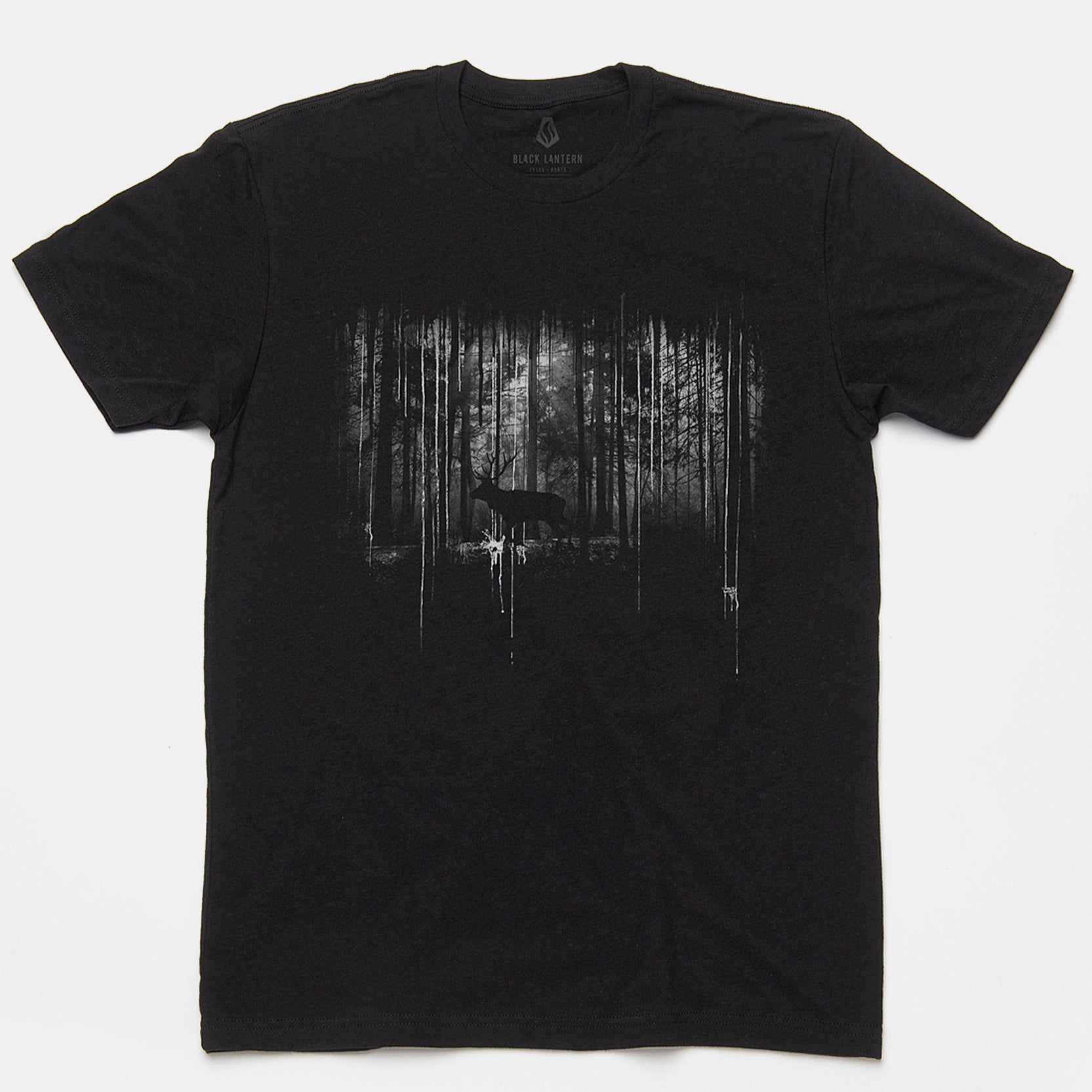 A black short-sleeve crewneck t-shirt featuring a distressed, high-contrast graphic print of a deer in a forest on the front, displayed flat against a light gray background.