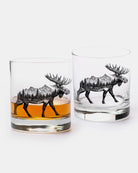 Two glasses with moose and mountain design on a white background